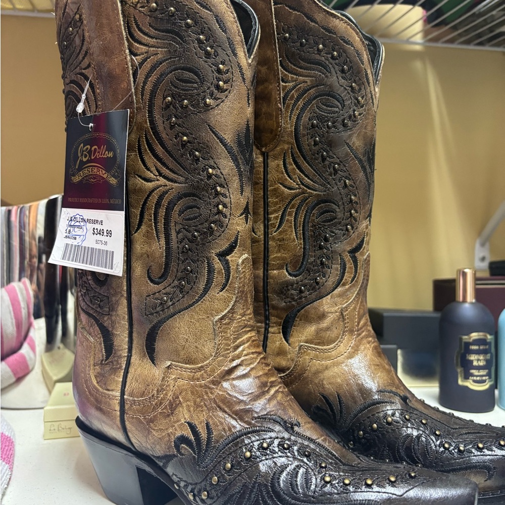 Brown and Black Heeled Boots with Intricate Design